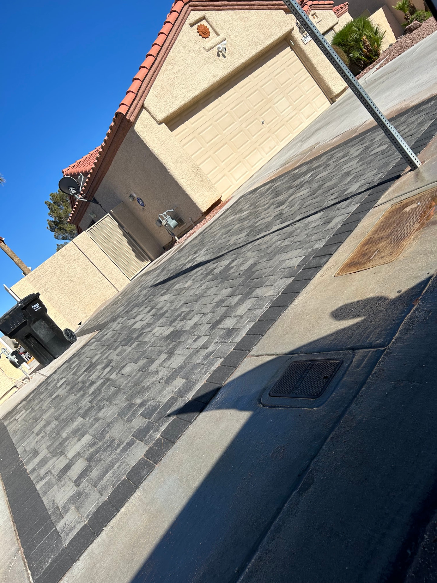 New paver driveway with contrasting soldier course border